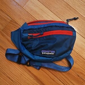 Patagonia Blue Waist Pack with Red Zippers